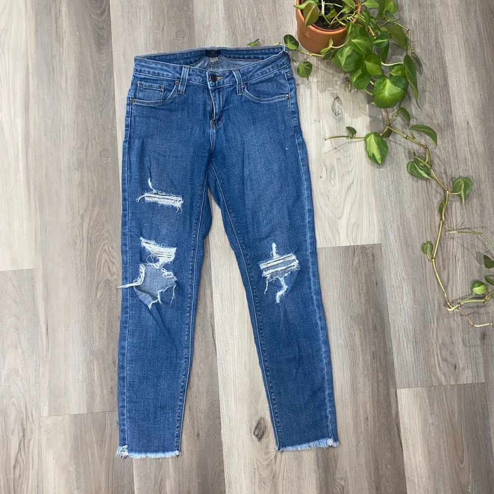 Ripped blue jeans